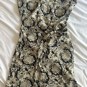 Elegant Black and Cream Patterned Dress